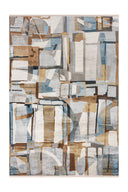 Mavi tonlarda, modern geometrik desenlere sahip Ruby RB003 salon halısı, odanın orta yerinde serili duruyor.