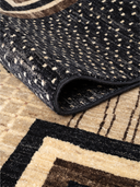 Bamboo Silk Black & Beige Hand-Knotted Rug 6' x 8'5" ED109 – rolled view