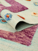 Relief Green & Purple Handwoven Kilim 3'3" x 5'1" ED17 – rolled view