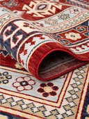 Yunser Red & Navy Wool Machine-Made Rug 5'5" x 7'9" ED192 – rolled view