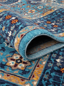 Yunser Blue & Navy Wool Machine-Made Rug 6'7" x 9'6" ED204 – rolled view