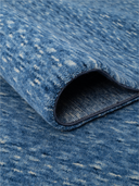 Yunser Blue Wool Machine-Made Rug 5'3" x 7'7" ED211 – rolled view