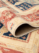 Ocean Ushak Red & Navy Hand-Knotted Rug 5'4" x 8'1" ED266 – rolled view