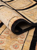 Ocean Ushak Black & Mustard Hand-Knotted Rug 6'9" x 9'4" ED267 – rolled view