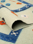 Relief Beige & Navy Handwoven Kilim 4'11" x 6'6" ED28 – rolled view