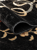 Karabakh Black & Red Hand-Knotted Rug 5'4" x 7' ED69 – rolled view