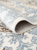 Floss Beige & Ecru Hand-Knotted Rug 5'6" x 7'11" ED75 – rolled view